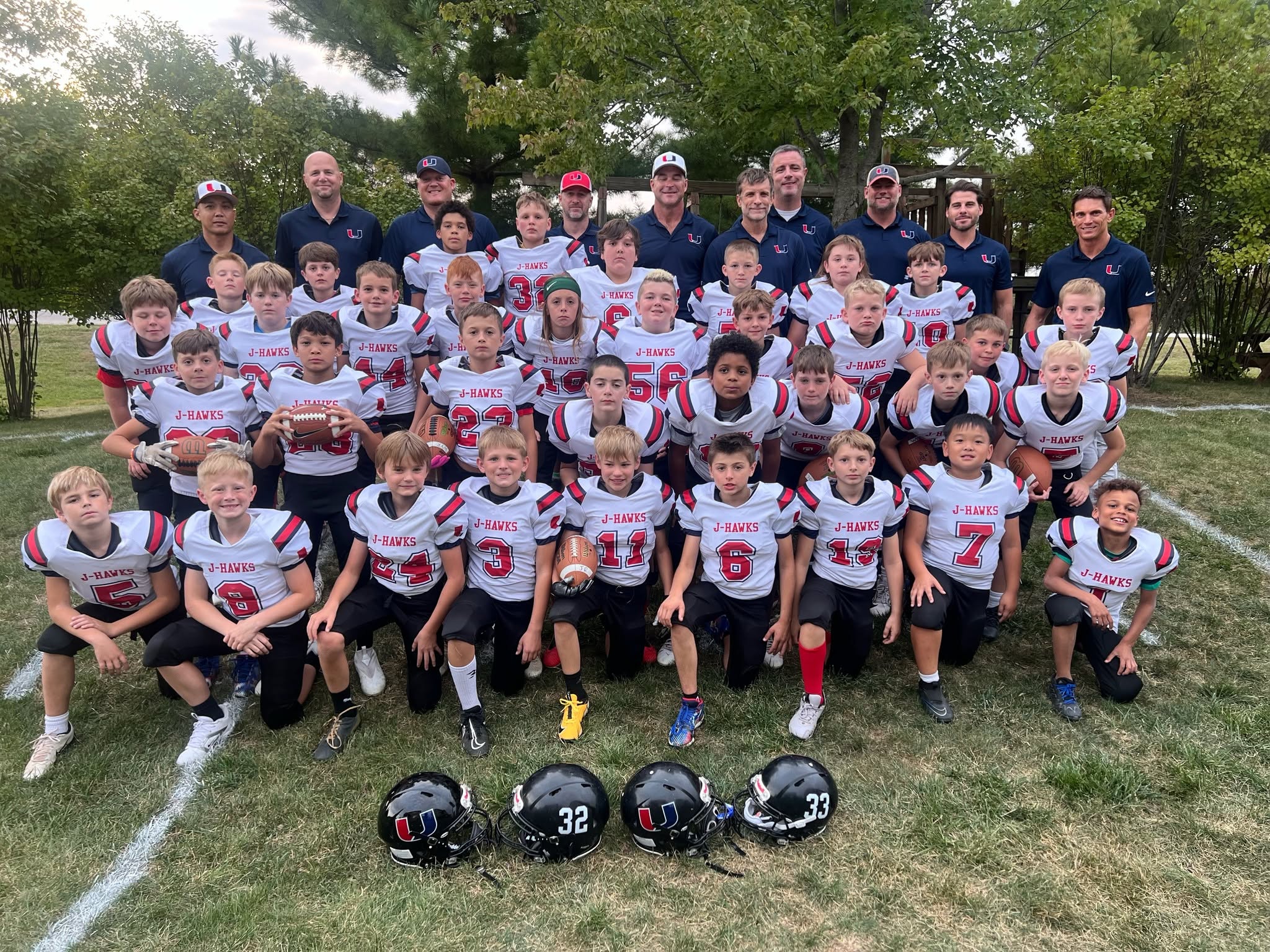 Urbandale J-Hawks youth football team photo with coaches